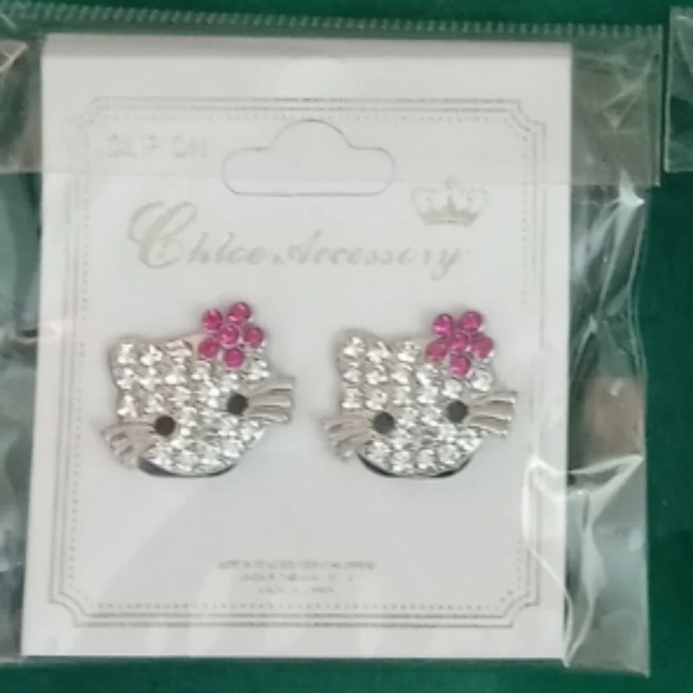 SILVER Hello Kitty CZ earrings *CLIP ON* These are CLIP ON** Hard to Find!… - Picture 1 of 6